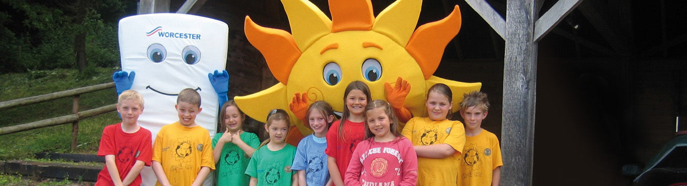 Photo of children with the Worcester mascots.